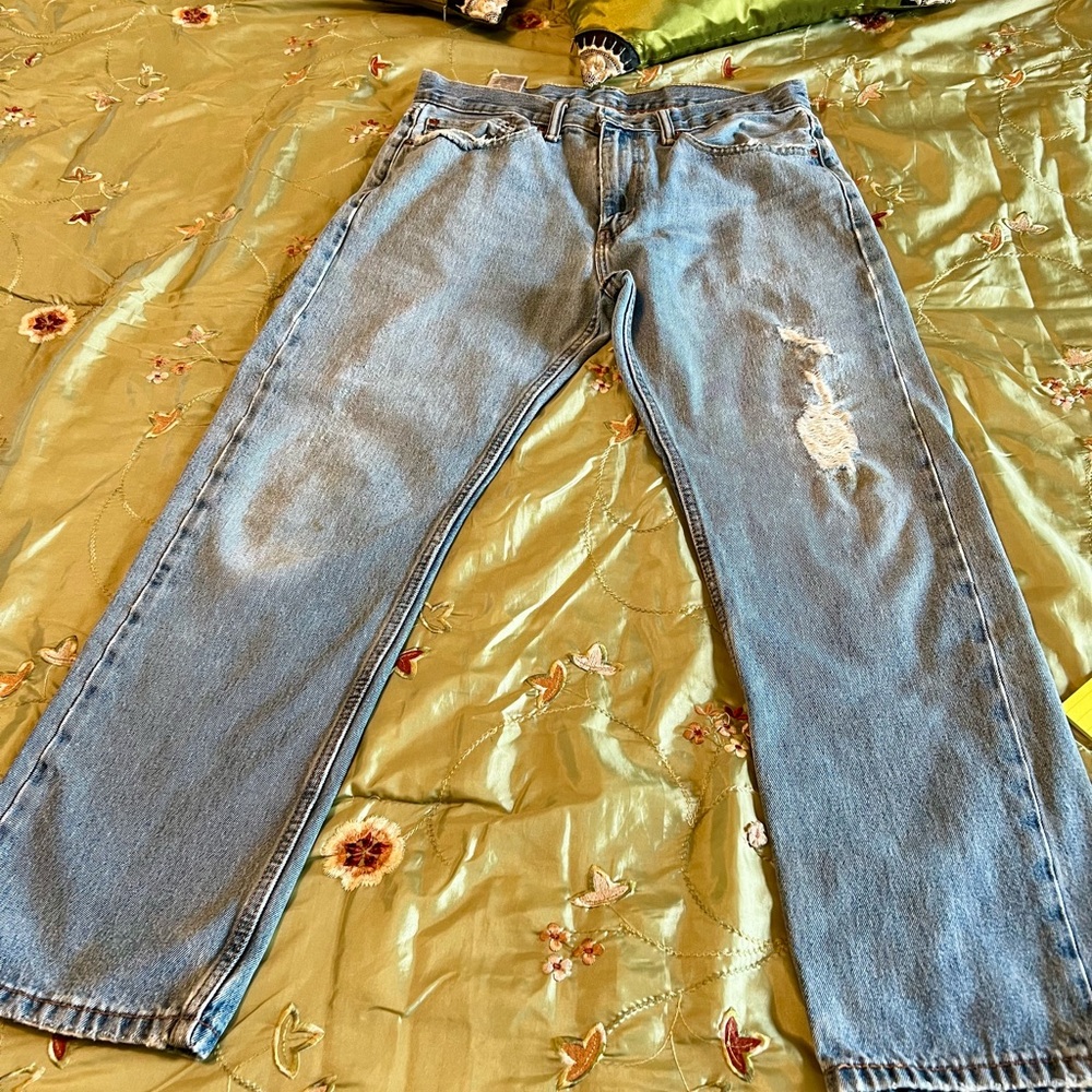 #4 Men's Levi Strauss & Co. 505 Blue Jeans
W/34 L/29, distressed and pre owned